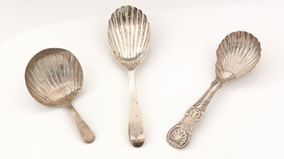 Lot 267 - A Victorian provincial silver caddy spoon and two George III Irish silver caddy spoons