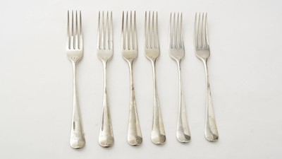 Lot 131 - A set of six George III silver table forks