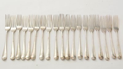 Lot 135 - A set of eleven George III silver dessert forks; and a set of eight George III silver dessert forks