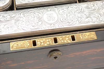 Lot 121 - A Victorian brass bound coromandel Wood toilet box