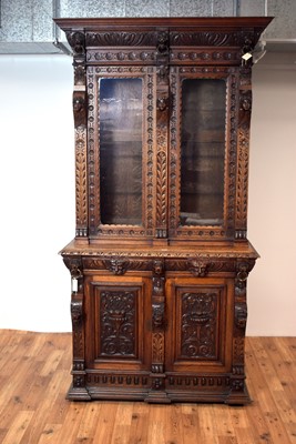 Lot 32 - A 19th Century carved oak glazed bookcase