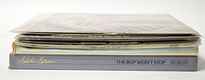 Lot 1028 - A collection of Shakin' Stevens LPs, foreign pressings, box sets, and 7" singles