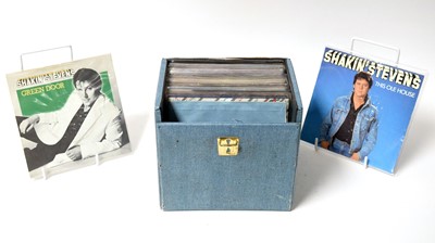 Lot 1028 - A collection of Shakin' Stevens LPs, foreign pressings, box sets, and 7" singles