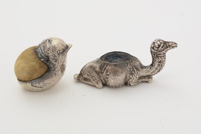 Lot 381 - An Edwardian silver novelty pin cushion in the form of a camel, and other items