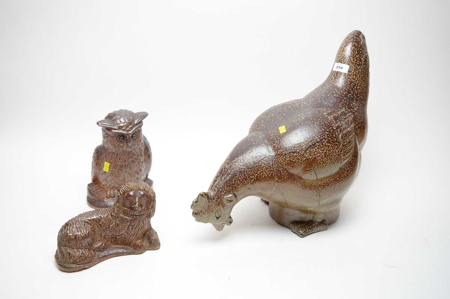 Lot 214 - A salt glazed pottery cockerel; and two others