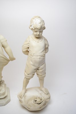 Lot 227 - An alabaster style plaster figure of a boy with frog