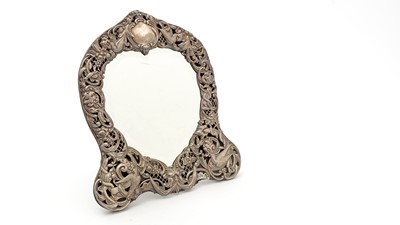 Lot 80 - A late Victorian silver mounted mirror frame