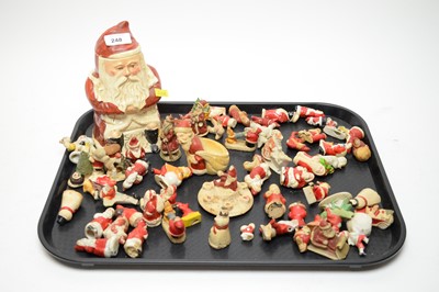 Lot 248 - A collection of vintage Christmas decorations and cake toppers