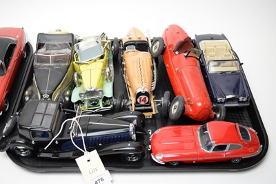 Lot 476 - A selection of diecast model cars and other vehicles.