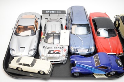 Lot 476 - A selection of diecast model cars and other vehicles.