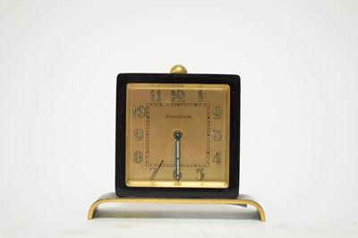Lot 331 - A Jaeger LeCoultre black lacquered bedside alarm clock