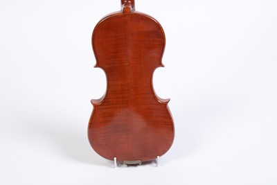 Lot 66 - A violin and two bows, in case