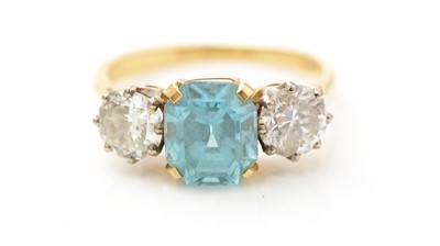 Lot 453 - A topaz and diamond ring