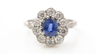 Lot 488 - A sapphire and diamond cluster ring