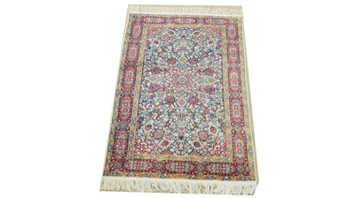 Lot 1144 - A Kirman rug