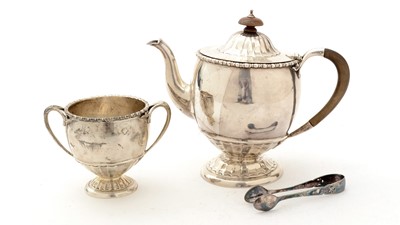 Lot 85 - ﻿A George V silver teapot and matching sugar bowl