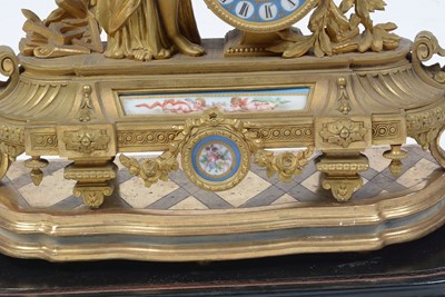 Lot 6 - Japy Freres: a late 19th Century French gilt metal figural mantel clock