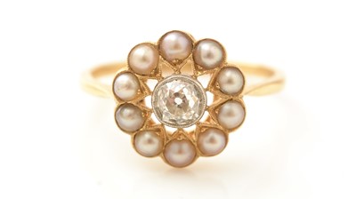 Lot 474 - A Victorian diamond and half-pearl cluster ring
