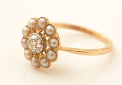 Lot 474 - A Victorian diamond and half-pearl cluster ring