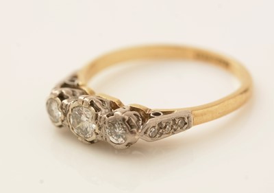 Lot 475 - A three stone diamond ring