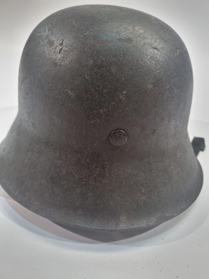 Lot 1010 - A German Second World War M35 pattern helmet