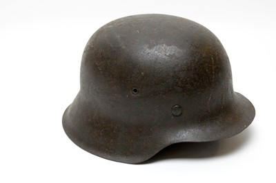Lot 1010 - A German Second World War M35 pattern helmet