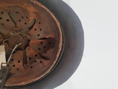 Lot 1010 - A German Second World War M35 pattern helmet