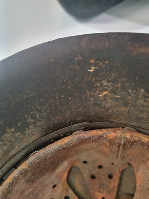 Lot 1010 - A German Second World War M35 pattern helmet