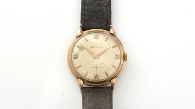 Lot 805 - Helvetia: a 9ct yellow gold cased manual wind wristwatch