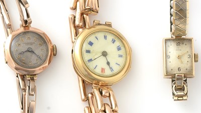 Lot 767 - Three gold cocktail watches, one by Omega
