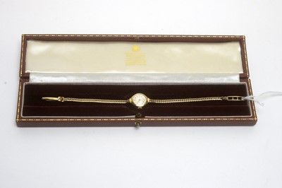 Lot 1149 - A Garrard 9ct yellow gold cased cocktail watch