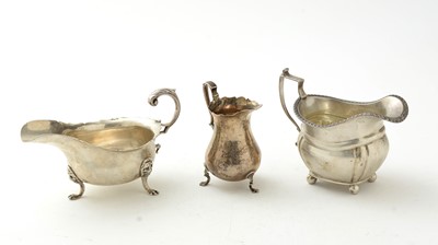 Lot 904 - Three silver jugs