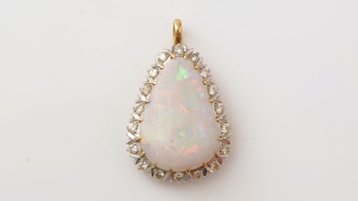 Lot 432 - An opal and diamond cluster pendant