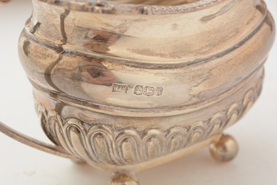 Lot 13 - A George V silver four piece tea set