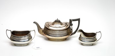 Lot 852 - A silver three-piece tea service, by E Silver & Co