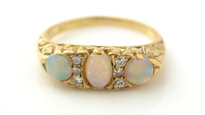 Lot 939 - An opal and diamond ring