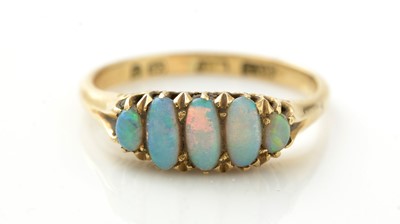 Lot 917 - A late Victorian five stone opal ring