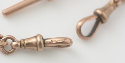 Lot 769 - A 9ct rose gold graduated albert chain, fitted with a George III gold guinea