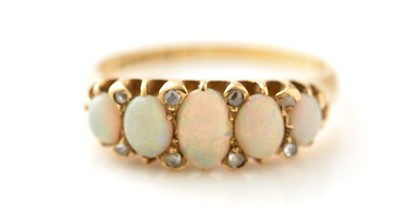 Lot 755 - An opal and diamond ring