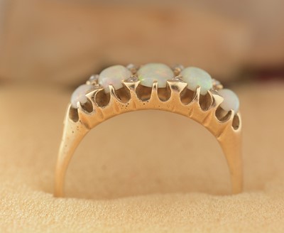 Lot 755 - An opal and diamond ring