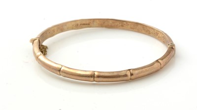 Lot 919 - A 9ct yellow gold bangle, of bamboo pattern