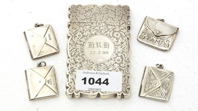 Lot 1044 - A silver calling card case, and a selection of envelope pattern stamp cases