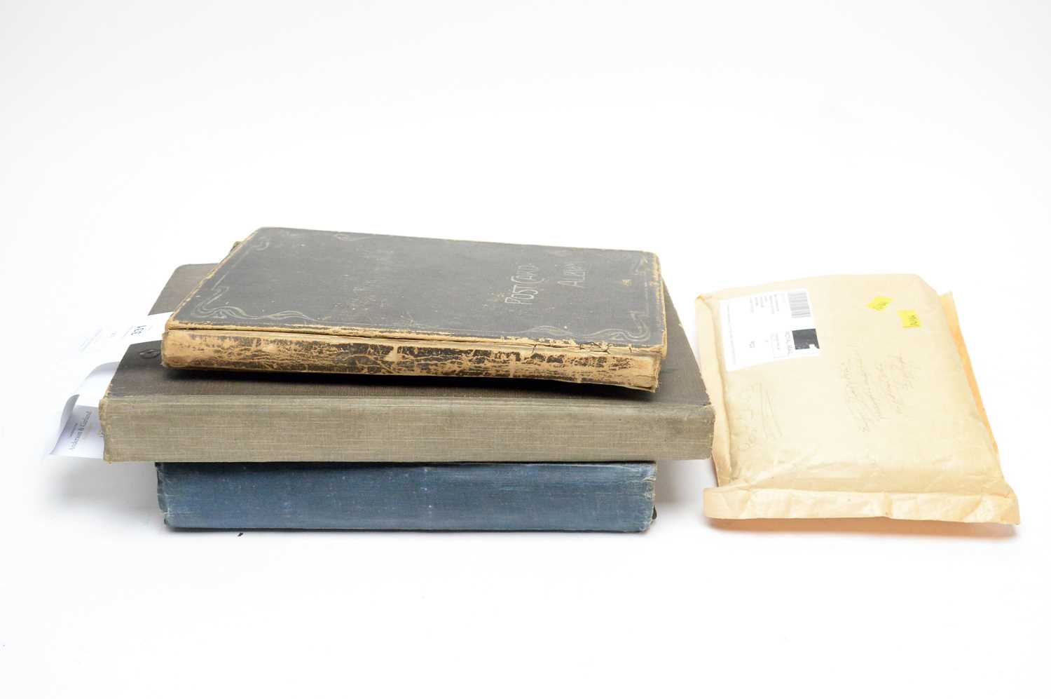 Lot 331 - Three early 20th Century postcard albums; together with loose vintage postcards