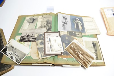 Lot 331 - Three early 20th Century postcard albums; together with loose vintage postcards