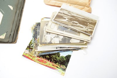 Lot 331 - Three early 20th Century postcard albums; together with loose vintage postcards
