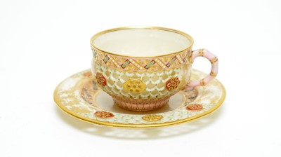 Lot 832 - Royal Worcester reticulated cabinet cup and saucer in the manner of George Owen