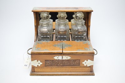 Lot 272 - A 20th Century oak tantalus liqueur box