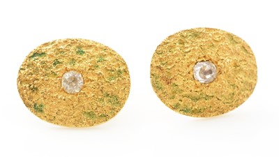 Lot 560 - A pair of diamond and 18ct yellow gold earrings