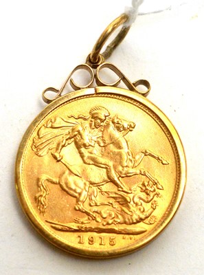 Lot 1238 - A George V gold sovereign, 1915, in 9ct yellow gold pendant mount