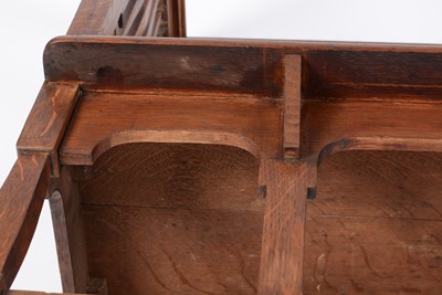 Lot 1310 - An early 20th Century Arts and Crafts oak hall settle by Shapland and Petter